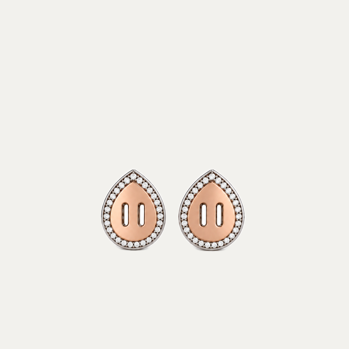 Venustas Gemina Drop Stud Earrings on a warm off-white background