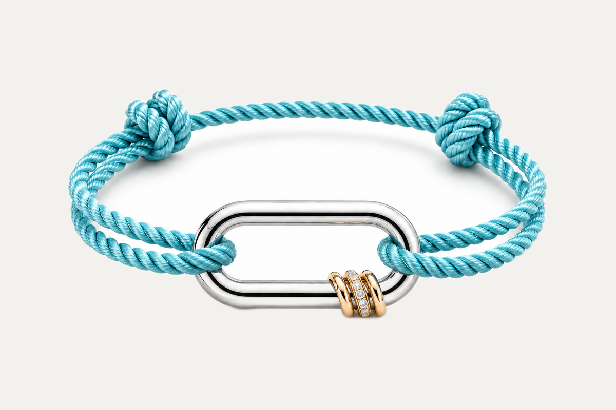 NEXUS LUMINA — Aegean Aqua on a warm off-white background