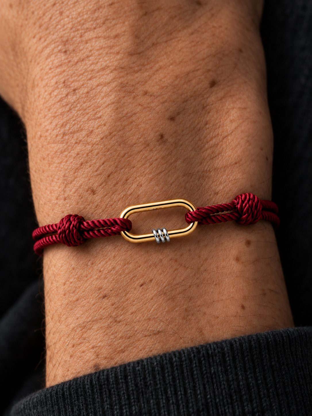 NEXUS Cord Bracelet — Garnet Red worn on wrist