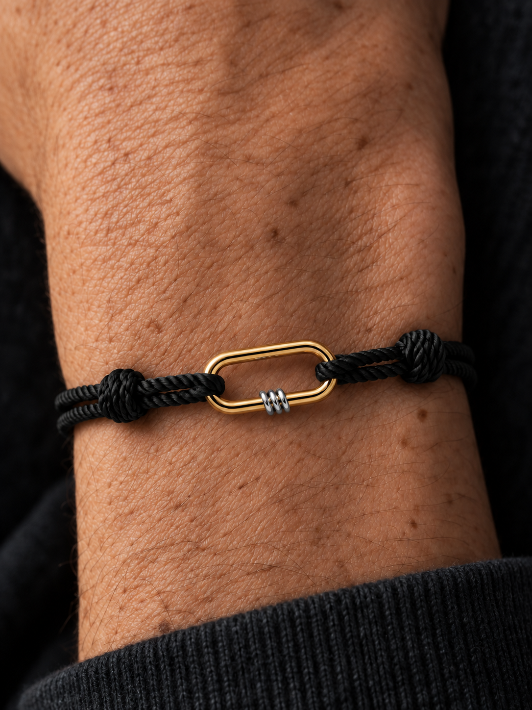 NEXUS Cord Bracelet — Obsidian Black worn on wrist