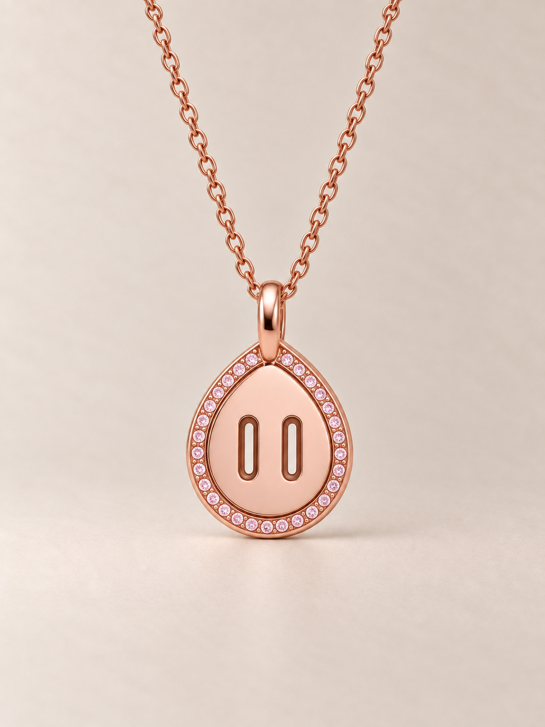 Venustas Gemina Drop Pavé Necklace, front view on a warm neutral studio background